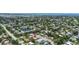 Aerial view of neighborhood with mature trees and lush landscaping conveniently located near Sarasota Bay at 6921 8Th Street E Ct, Sarasota, FL 34243