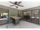 Entertain outdoors at the covered patio with a built-in bar, perfect for gatherings and relaxation at 6921 8Th Street E Ct, Sarasota, FL 34243
