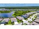 Aerial view of a serene neighborhood featuring homes with easy access to neighborhood streets and lush landscaping at 7420 Paradiso Dr, Apollo Beach, FL 33572