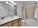 Bathroom with a light-colored shower/tub combo, toilet, and vanity with white countertop at 7420 Paradiso Dr, Apollo Beach, FL 33572