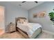 Bedroom featuring a bed with pillows and a nightstand with three drawers at 7420 Paradiso Dr, Apollo Beach, FL 33572