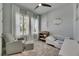 Cozy Bedroom with soft rug, crib, and window shutters allowing natural light at 7420 Paradiso Dr, Apollo Beach, FL 33572