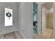 Inviting entryway with decorative glass door, stylish rug, and views to the Bedroom and bathroom at 7420 Paradiso Dr, Apollo Beach, FL 33572