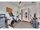 Versatile space, perfect for a home office and gym, with ample light and modern equipment at 7420 Paradiso Dr, Apollo Beach, FL 33572