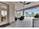 Outdoor patio with dining, seating, and a stunning pool view at 7420 Paradiso Dr, Apollo Beach, FL 33572
