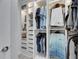 Walk-in closet featuring custom organizers and ample space at 7420 Paradiso Dr, Apollo Beach, FL 33572