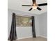 Bedroom featuring a ceiling fan, and gray walls at 8626 Woodbridge Dr, New Port Richey, FL 34655