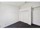 Neutral bedroom featuring neutral carpeting and a closet at 899 Addison Ne Dr, St Petersburg, FL 33716