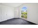 Corner bedroom featuring lots of natural light from large windows at 899 Addison Ne Dr, St Petersburg, FL 33716