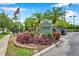 Recreation Center entrance sign with lush landscaping, creating an inviting atmosphere for residents at 899 Addison Ne Dr, St Petersburg, FL 33716