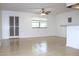 Bright and open floor plan with tile floors, leading to the kitchen and backyard at 101 Cambridge Trl # 194, Sun City Center, FL 33573