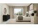 Bedroom featuring a large window, modern decor, and neutral tones to create a relaxing atmosphere at 10198 Trumpet Honeysuckle Way, San Antonio, FL 33576