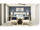 Serene main bedroom with soft natural lighting, blue accent wall, and tasteful decor creating a calming retreat at 10211 Trumpet Honeysuckle Way, San Antonio, FL 33576