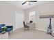 This is a well-organized bedroom with a desk, chair and decor at 106 Cutlass Way, Oldsmar, FL 34677