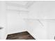 Walk in closet with wood floors and wire rack shelves at 106 Cutlass Way, Oldsmar, FL 34677