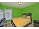 Bedroom featuring carpet flooring, natural light from the window, and neutral decor at 11415 Bright Star Ln, Riverview, FL 33569