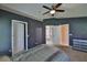 Main bedroom boasts carpet flooring, and an ensuite bathroom with walk-in closet at 11415 Bright Star Ln, Riverview, FL 33569