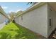 Exterior shot showing the yard of the home with blue skies and green grass at 11708 Crest Creek Dr, Riverview, FL 33569