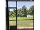 Backyard featuring lush greenery and a private fenced-in yard at 11901 Castine St, New Port Richey, FL 34654