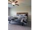 Bedroom with ceiling fan and carpet at 11901 Castine St, New Port Richey, FL 34654