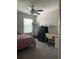 Cozy bedroom with carpet and ceiling fan at 11901 Castine St, New Port Richey, FL 34654