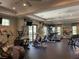 Well-equipped fitness center with treadmills, ellipticals, and weight machines for workouts at 11901 Castine St, New Port Richey, FL 34654