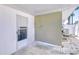 Covered back porch area with access to the backyard and showing the house utilities at 12033 82Nd Ave, Seminole, FL 33772