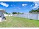 The property's backyard is enclosed by a fence to maximize seclusion at 12033 82Nd Ave, Seminole, FL 33772
