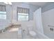 Bathroom showcasing a shower and tub combination, with a neutral color scheme at 12033 82Nd Ave, Seminole, FL 33772