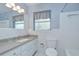 Bathroom showcasing a shower and tub combination, with a neutral color scheme at 12033 82Nd Ave, Seminole, FL 33772
