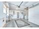 Bright garage space featuring laundry area, storage cabinets, and access to the outdoors at 12033 82Nd Ave, Seminole, FL 33772