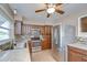 Modern kitchen with stainless steel appliances, dark wood cabinets, and a stylish backsplash at 12033 82Nd Ave, Seminole, FL 33772
