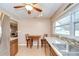 Eat-in kitchen area with stainless steel refrigerator and backyard window at 12033 82Nd Ave, Seminole, FL 33772
