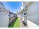 The side yard offers a blend of functional space and aesthetic appeal at 12033 82Nd Ave, Seminole, FL 33772