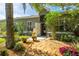 Charming single-story home with inviting front entrance and lush landscaping at 12134 Tournament View Ave, New Port Richey, FL 34654