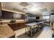 Well-equipped commercial kitchen with granite counters, stainless appliances, and ample prep space at 12134 Tournament View Ave, New Port Richey, FL 34654