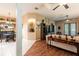 Open-concept living room featuring hardwood floors and elegant decor at 12134 Tournament View Ave, New Port Richey, FL 34654