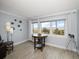 Bright room with beach views, a round table, and wood-look tile flooring at 1230 Gulf Blvd # 304, Clearwater, FL 33767