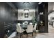 Dining room featuring a modern chandelier, stylish decor, and views of the kitchen and living room at 12937 Ogden Glade Rd, Dade City, FL 33525