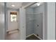Entryway with storage closet and view of the front door at 13907 Fletchers Mill Dr, Tampa, FL 33613