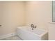 Modern soaking tub with black fixtures at 1413 Bayshore Blvd # 11, Dunedin, FL 34698