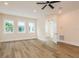 Inviting bedroom featuring wood flooring, large windows and neutral tones for a serene atmosphere at 1413 Bayshore Blvd # 11, Dunedin, FL 34698