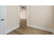 Cozy bedroom showcasing wood flooring, natural light and a fresh, neutral color palette at 1413 Bayshore Blvd # 11, Dunedin, FL 34698