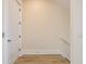 Hallway with stairs and view of bedroom at 1413 Bayshore Blvd # 11, Dunedin, FL 34698