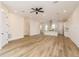 Bright and airy living room with stylish wood flooring and ample space for relaxation and entertainment at 1413 Bayshore Blvd # 11, Dunedin, FL 34698