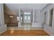 Bright foyer with views into the living and dining areas plus high ceilings at 16502 Windsor Park Dr, Lutz, FL 33549