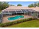 Aerial view of the backyard pool and patio area at 17818 Arbor Greene Dr, Tampa, FL 33647