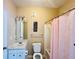 A full bathroom with a shower and a decorative shower curtain and fan at 17942 Villa Creek Dr # 17942, Tampa, FL 33647