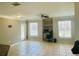 Bright living room with natural light, workstation, and ceiling fan at 17942 Villa Creek Dr # 17942, Tampa, FL 33647