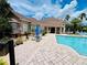Inviting poolside patio with comfortable seating, perfect for relaxation and entertaining at 17942 Villa Creek Dr # 17942, Tampa, FL 33647